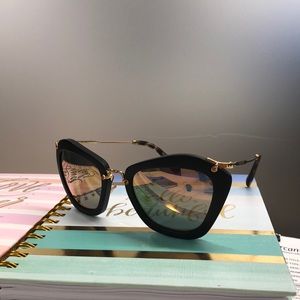 Miu miu Black Glasses with mirror lense